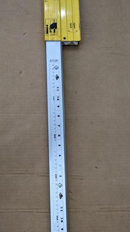 Stabila 12' extension level. Sticks slightly when closing. Vials and windows are good.