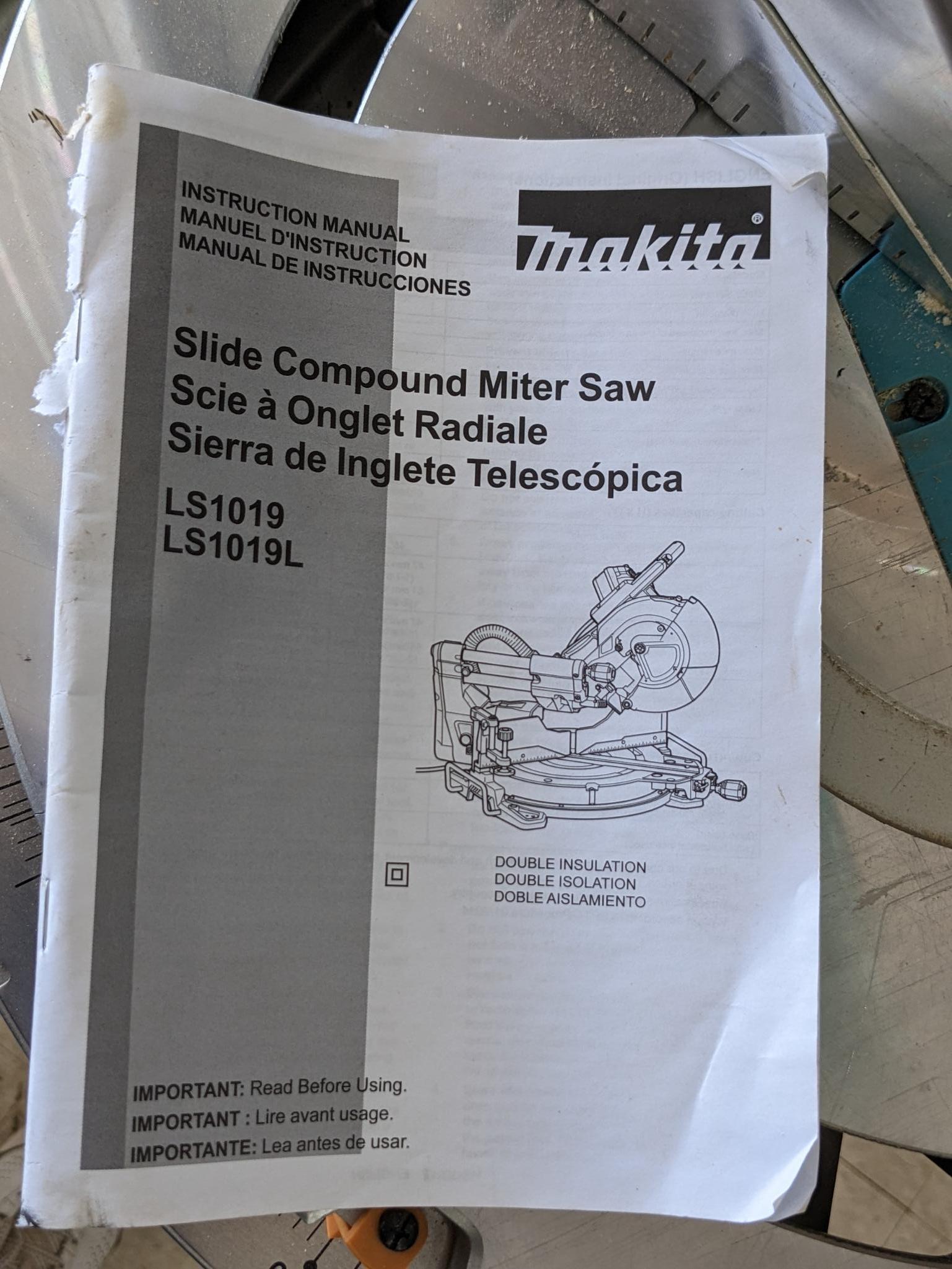 Makita sliding compound miter saw w/ laser guide, angle up to 60 degrees. Has dust bag, and comes on