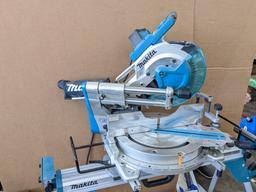 Makita sliding compound miter saw w/ laser guide, angle up to 60 degrees. Has dust bag, and comes on