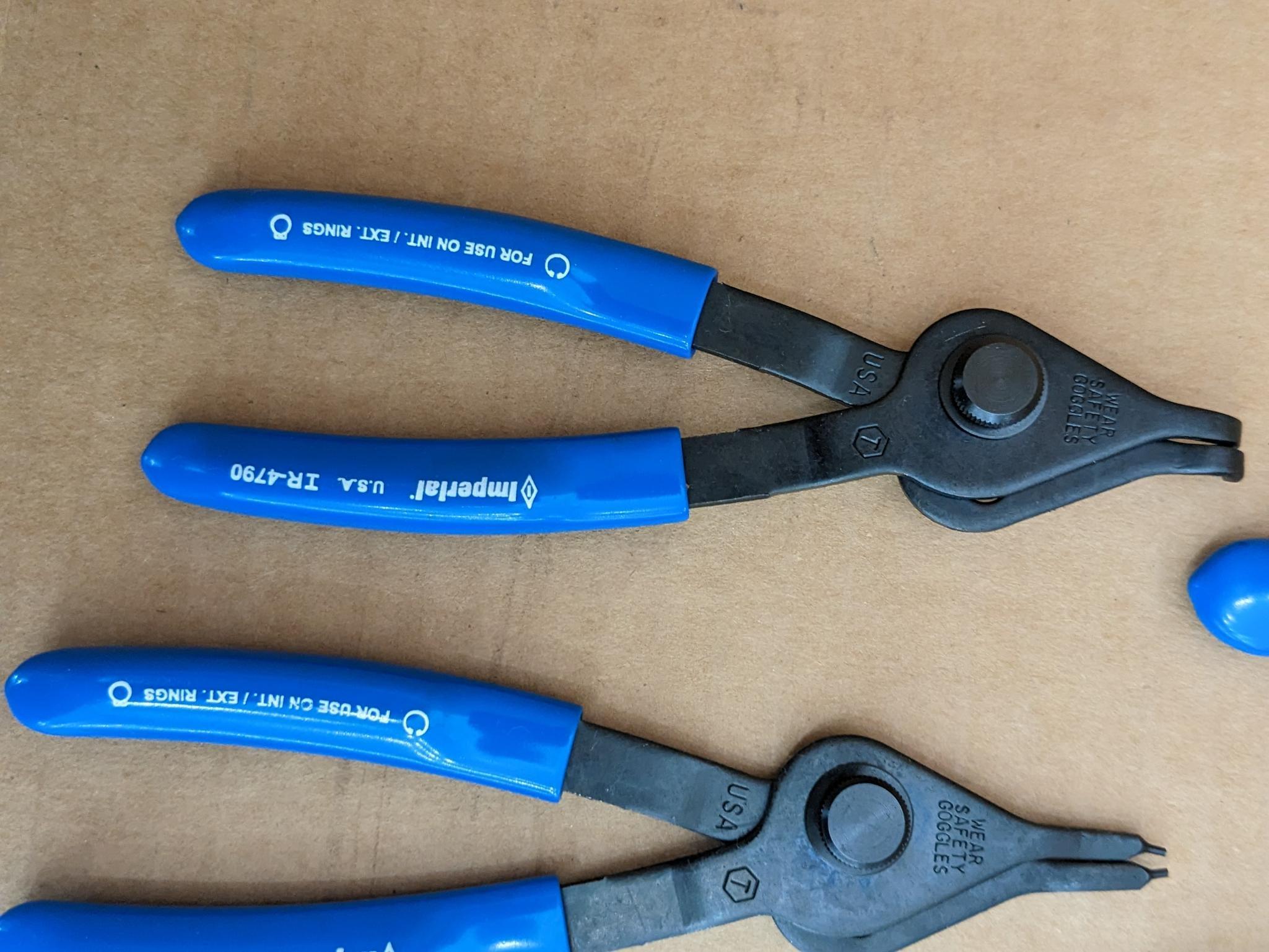 Imperial snap ring plier set incl six pliers and is Model No. IR-090K. In good condition with case.