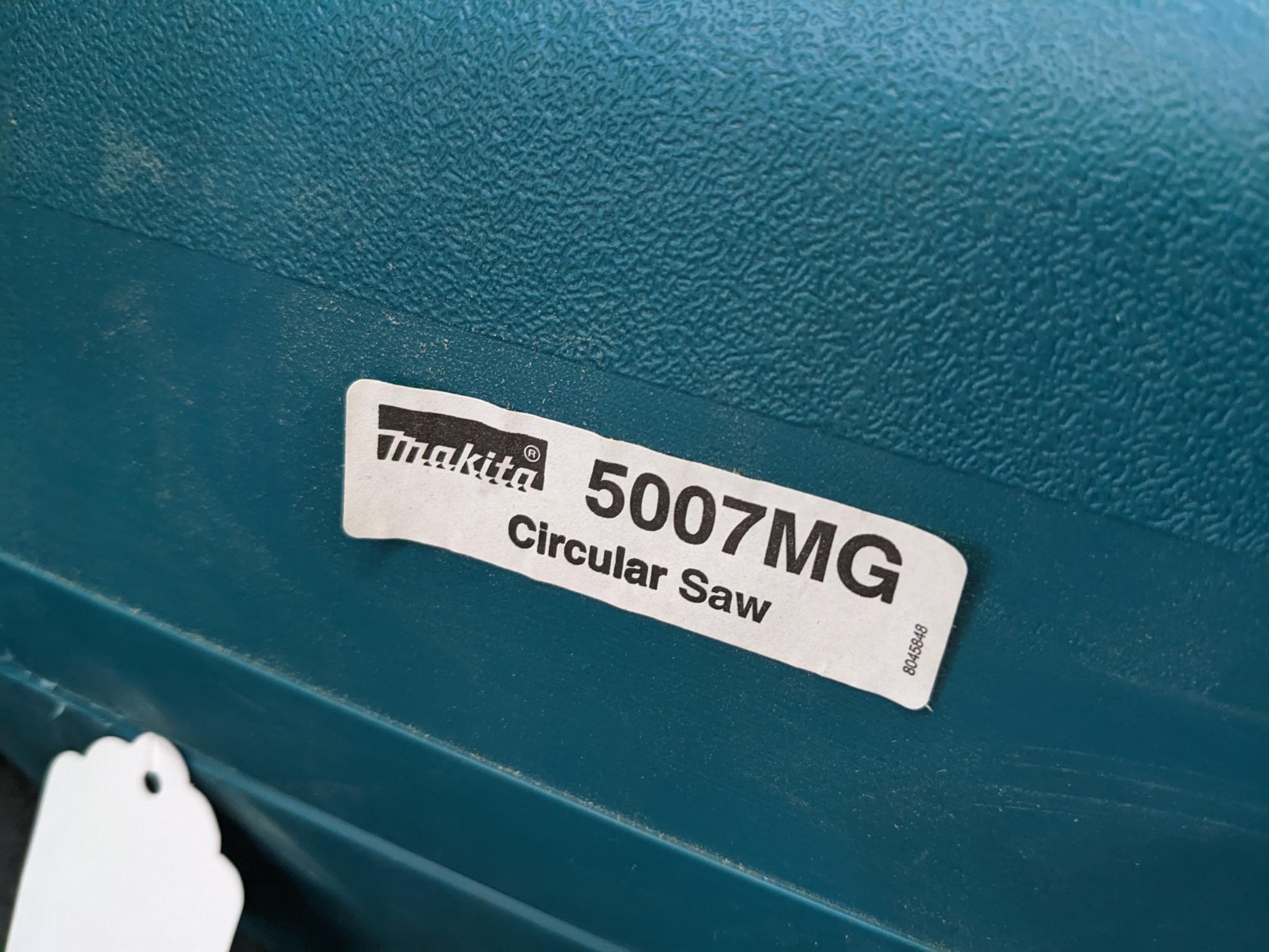 Makita magnesium 7 1/4" circular saw w/ blade guide, hard case, and original papers. Saw is in very