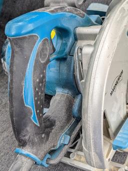 Makita magnesium 7 1/4" circular saw w/ blade guide, hard case, and original papers. Saw is in very