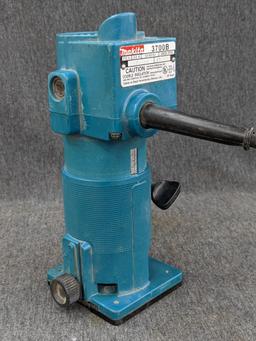 Makita 3700B trim router. runs up to 28,000 rpm. currently has 1/2" square-cut bit.