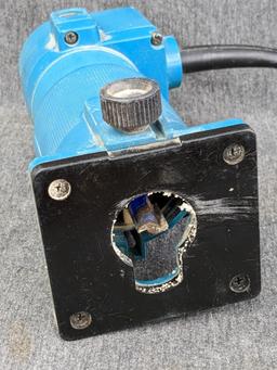 Makita 3700B trim router. runs up to 28,000 rpm. currently has 1/2" square-cut bit.