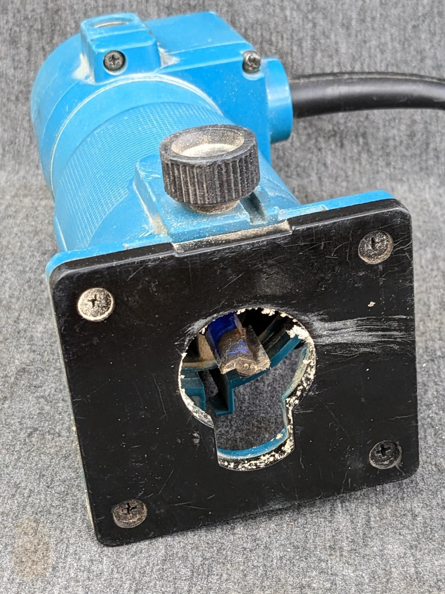 Makita 3700B trim router. runs up to 28,000 rpm. currently has 1/2" square-cut bit.