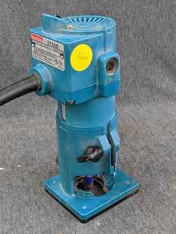 Makita 3700B trim router. runs up to 28,000 rpm. currently has 1/2" square-cut bit.