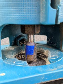 Makita 3700B trim router. runs up to 28,000 rpm. currently has 1/2" square-cut bit.
