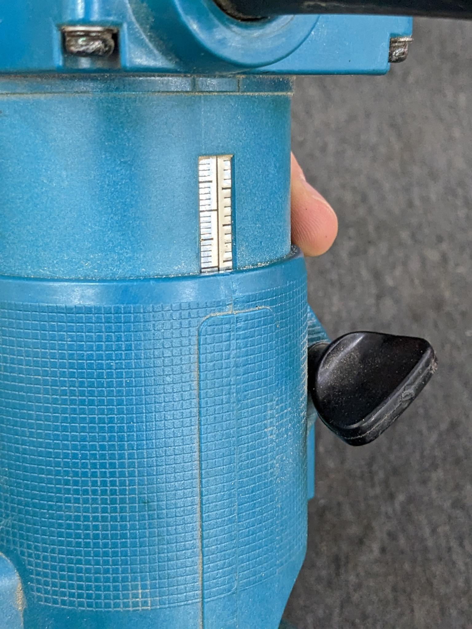 Makita 3700B trim router. runs up to 28,000 rpm. currently has 1/2" square-cut bit.