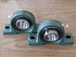 Pair of FSB pillow block bearing model no. P21 have 2" ID center race and outer grease zerk. Are new