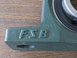 Pair of FSB pillow block bearing model no. P21 have 2" ID center race and outer grease zerk. Are new