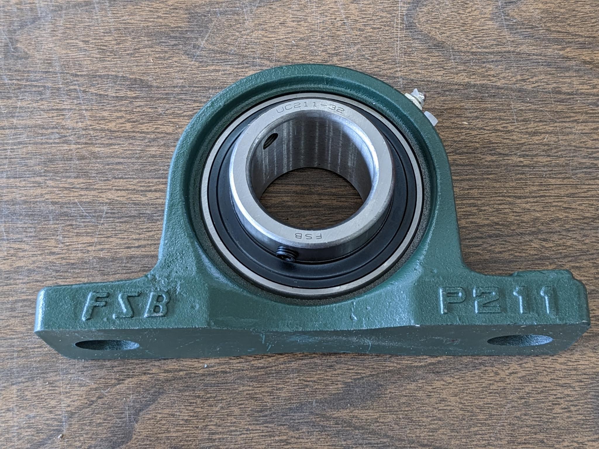 Pair of FSB pillow block bearing model no. P21 have 2" ID center race and outer grease zerk. Are new