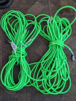 Two contractor extension cords. Notable tearing in outer insulation noted.