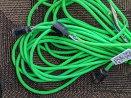 Two contractor extension cords. Notable tearing in outer insulation noted.