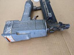 Paslode pneumatic crown stapler, tags are missing but it looks to take staples up to 2" tall.