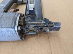 Paslode pneumatic crown stapler, tags are missing but it looks to take staples up to 2" tall.