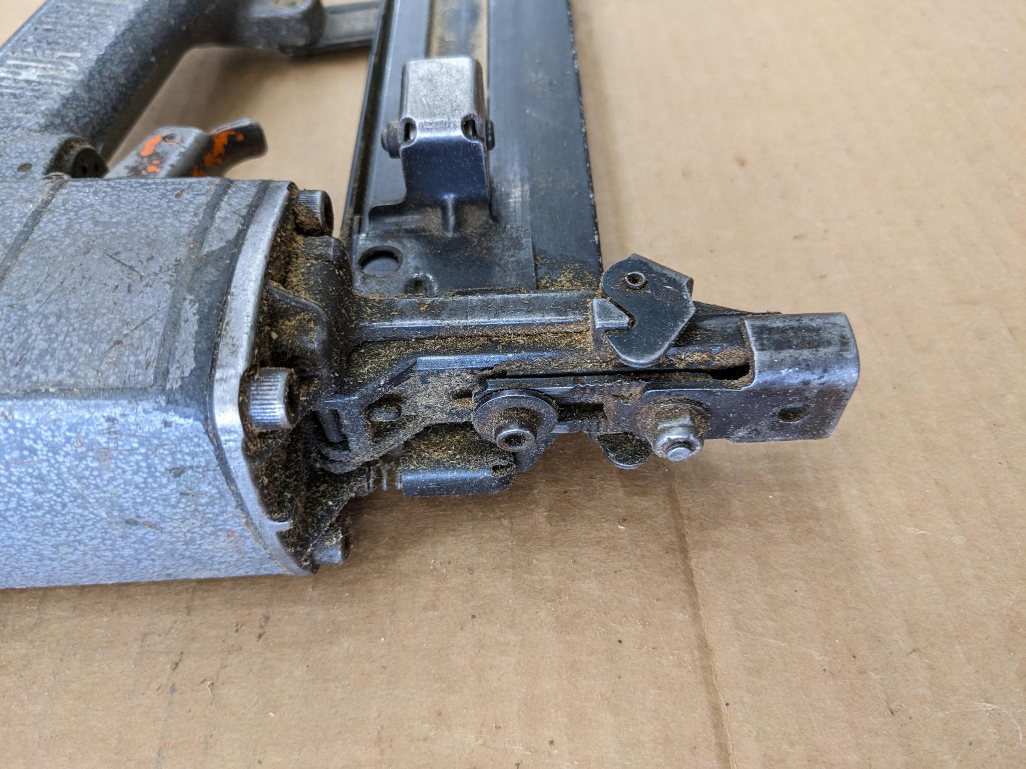 Paslode pneumatic crown stapler, tags are missing but it looks to take staples up to 2" tall.