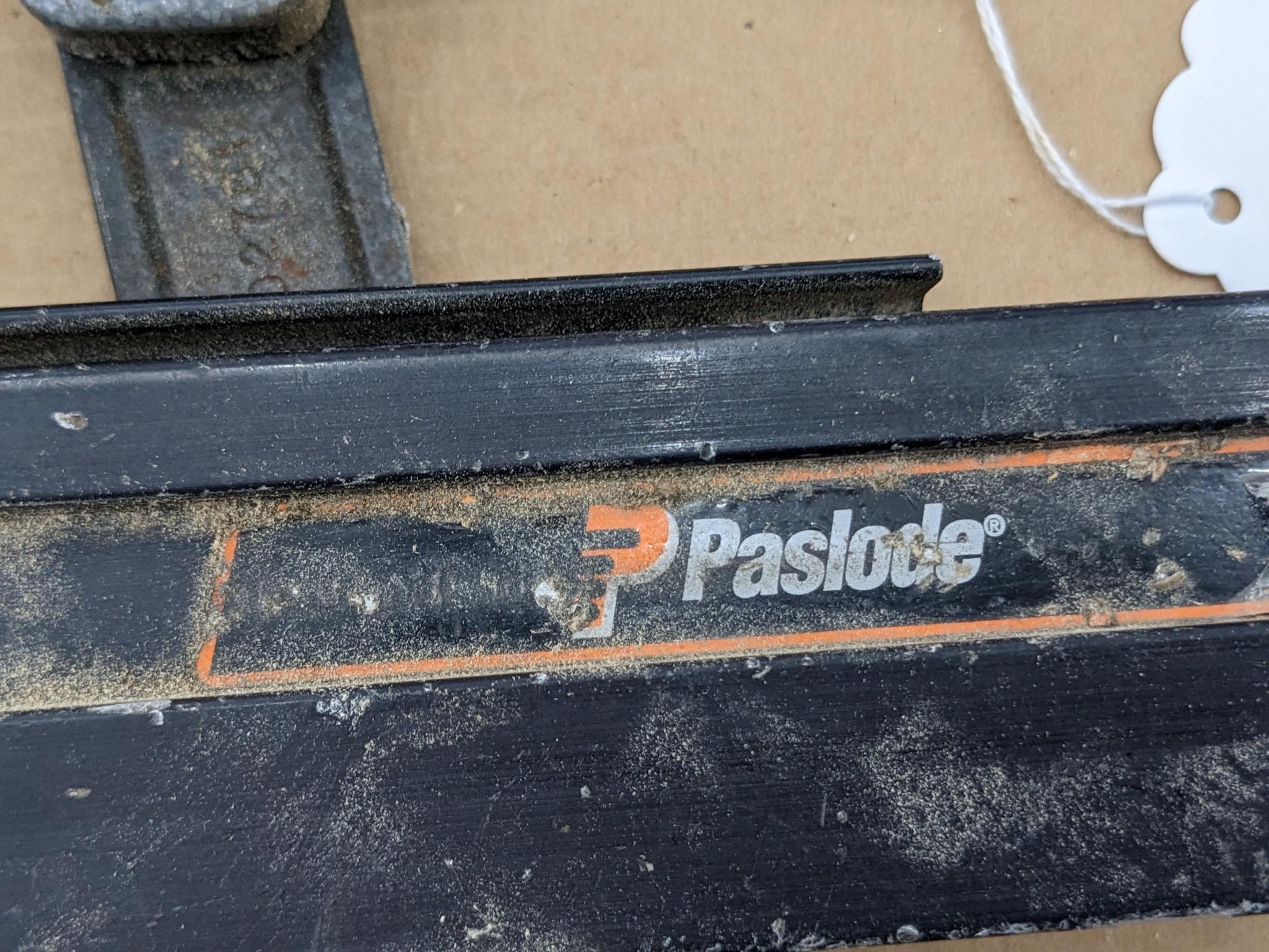 Paslode pneumatic crown stapler, tags are missing but it looks to take staples up to 2" tall.
