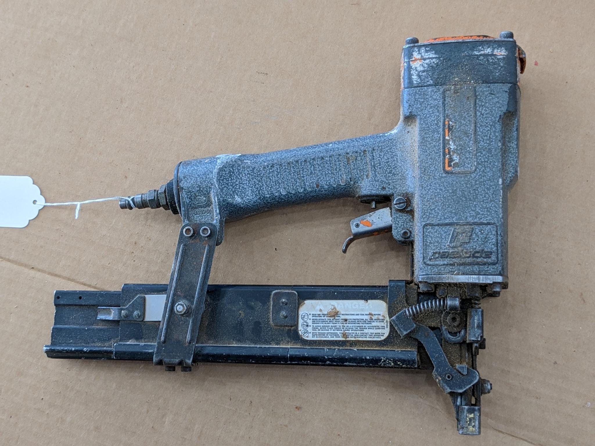 Paslode pneumatic crown stapler, tags are missing but it looks to take staples up to 2" tall.