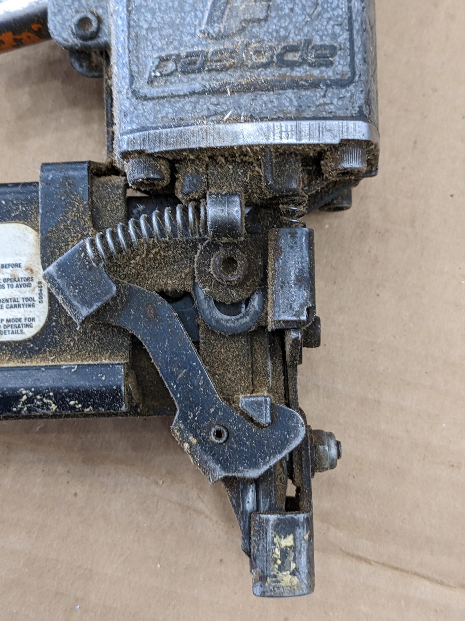 Paslode pneumatic crown stapler, tags are missing but it looks to take staples up to 2" tall.