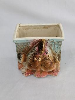 Several vintage planters would look great in your kitchen window. Pieces in overall nice condition