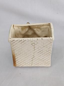 Several vintage planters would look great in your kitchen window. Pieces in overall nice condition