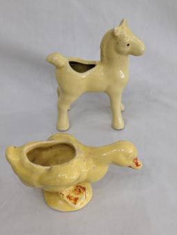 Several vintage planters would look great in your kitchen window. Pieces in overall nice condition