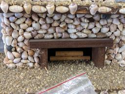 Interesting clock made with shells; measures 12" x 6-1/2" x 10-1/2" tall. Seller states it works and