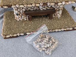 Interesting clock made with shells; measures 12" x 6-1/2" x 10-1/2" tall. Seller states it works and