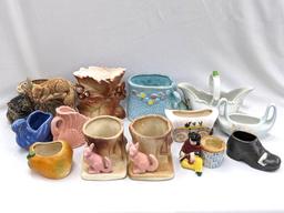 Small vases and planters; largest vase measures 5" x 5".