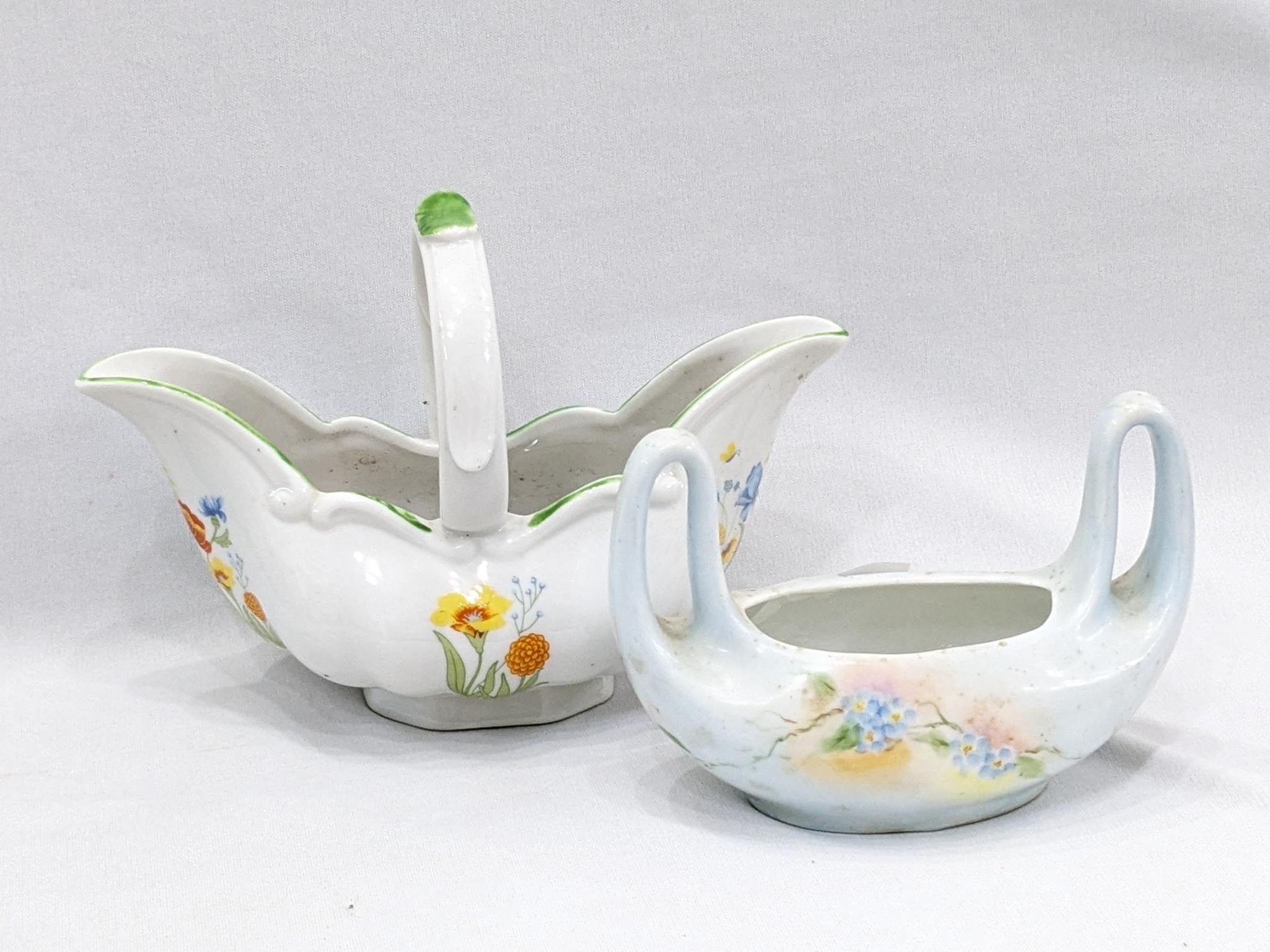 Small vases and planters; largest vase measures 5" x 5".