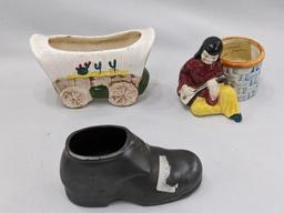 Small vases and planters; largest vase measures 5" x 5".
