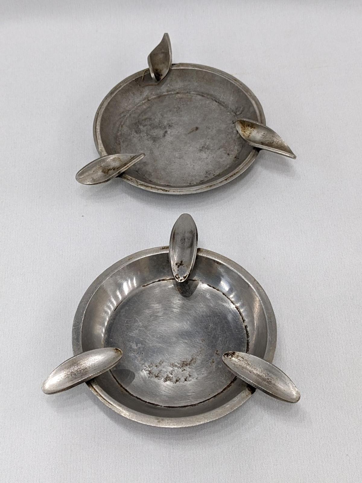 Two pewter ashtrays; measures 4-5" across.