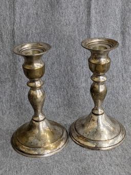 Two sets of silver plated candle holders; taller set measures 6-1/4" tall.