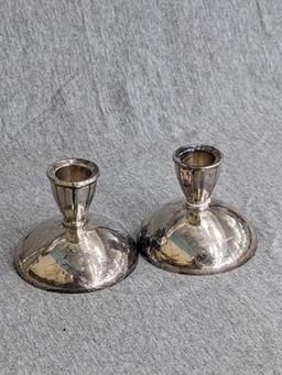 Two sets of silver plated candle holders; taller set measures 6-1/4" tall.