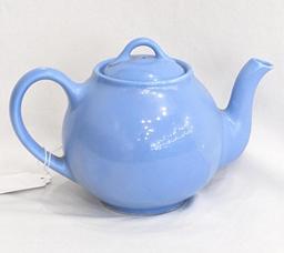 Teapot with made in USA, Lipton's Tea stamped on bottom; measures 5-1/2" tall.