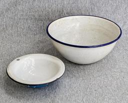 Two enamelware bowls; larger bowl measures 6" x 3". Smaller bowl has a beautiful blue and white