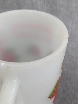 Three old Strawberry Shortcake mugs were made by Anchor Hocking. A couple chips noted on one rim and
