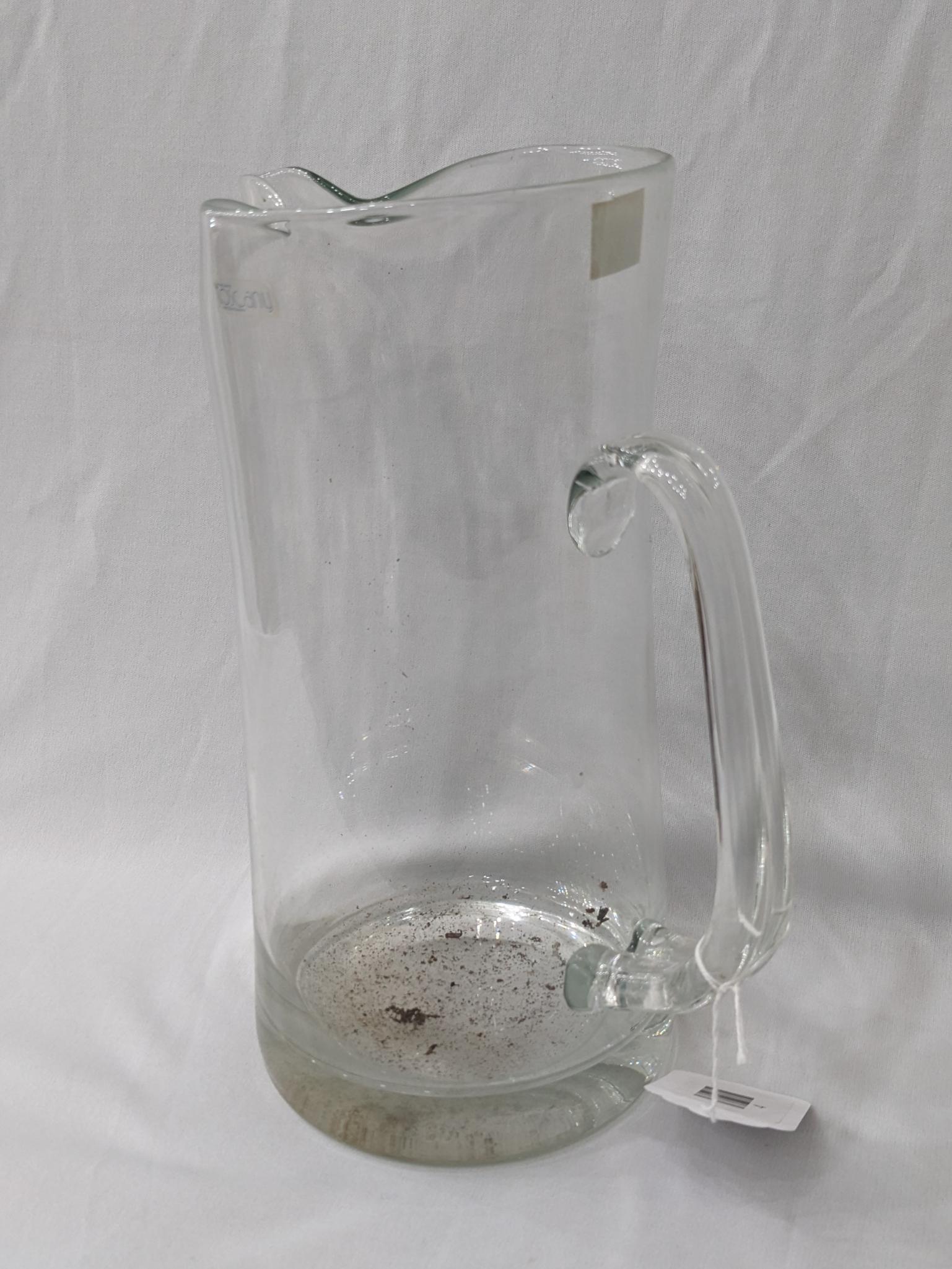 Hand made Tuscany pitcher with applied handle was made in Romania. In good condition, larger than