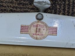 Old Handy Hot stovetop washing machine with original wringer. Neat piece from when work was work 14"