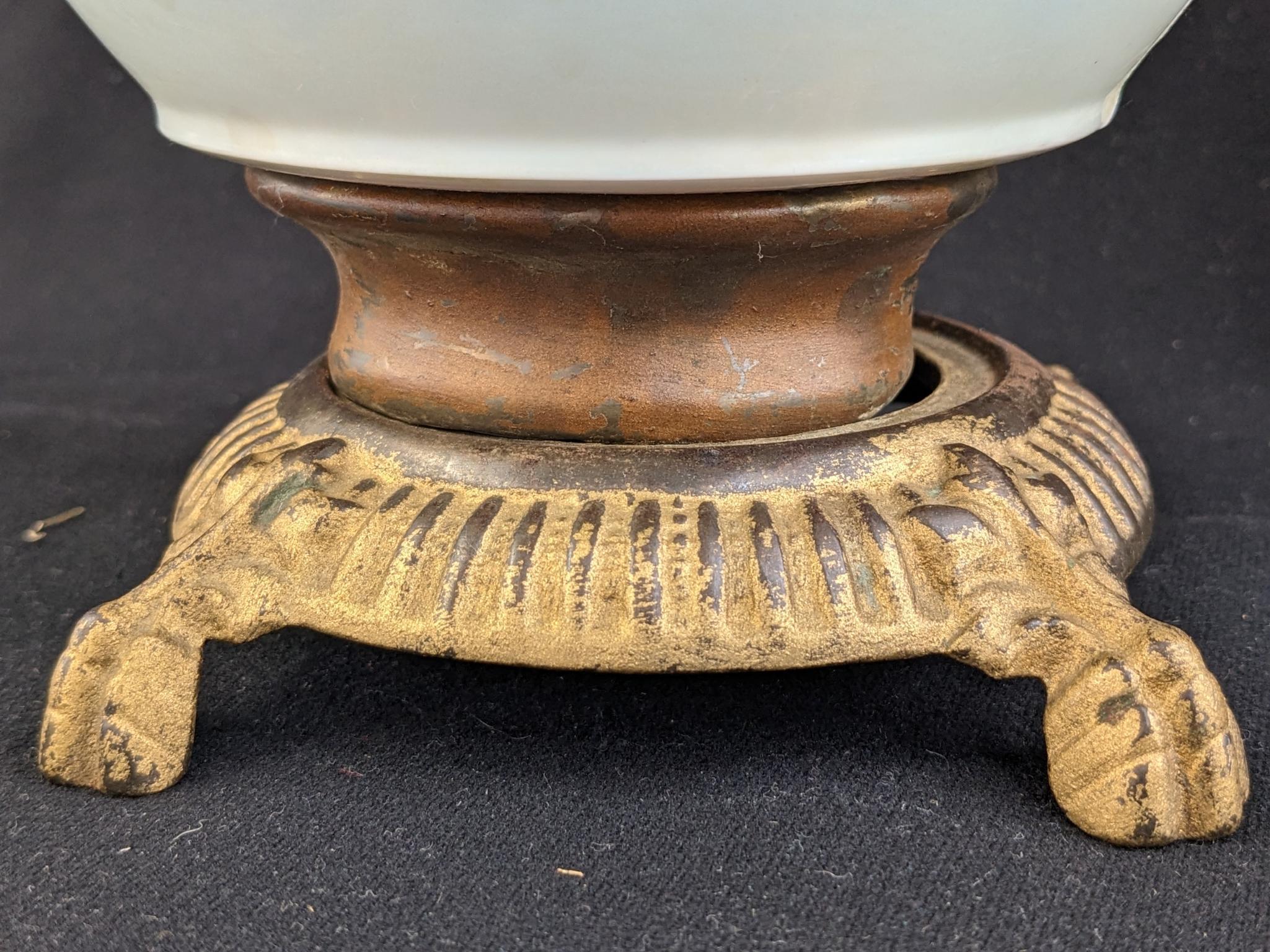 Pretty parlor oil lamp is 17" over chimney and has Eagle burner. For decoration only, notable chips