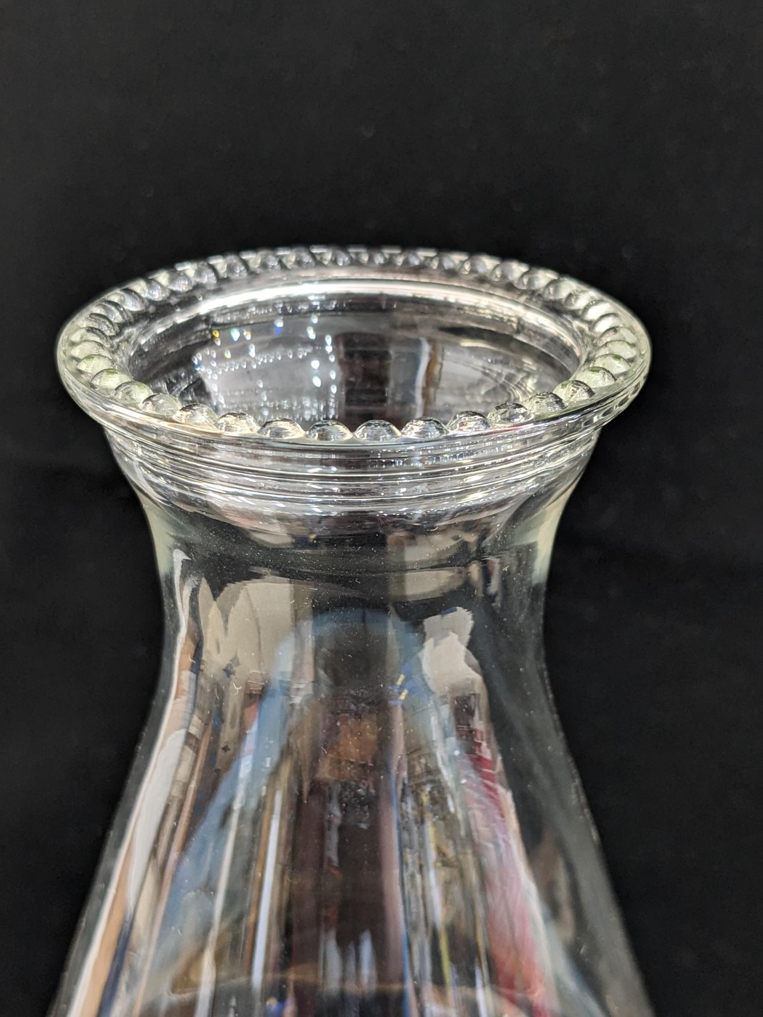 Pretty parlor oil lamp is 17" over chimney and has Eagle burner. For decoration only, notable chips