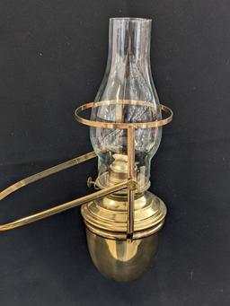 Neat swinging oil lamp has an Eagle burner and stands nearly 19". Chimney in good condition, some