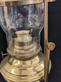 Neat swinging oil lamp has an Eagle burner and stands nearly 19". Chimney in good condition, some