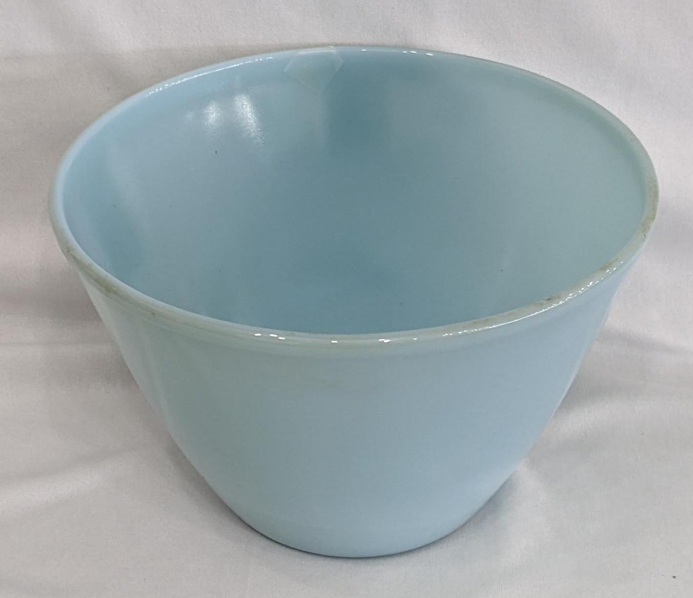 Fire King delphite blue mixing bowl is in good condition and measures about 8-1/2" x 5-1/2".