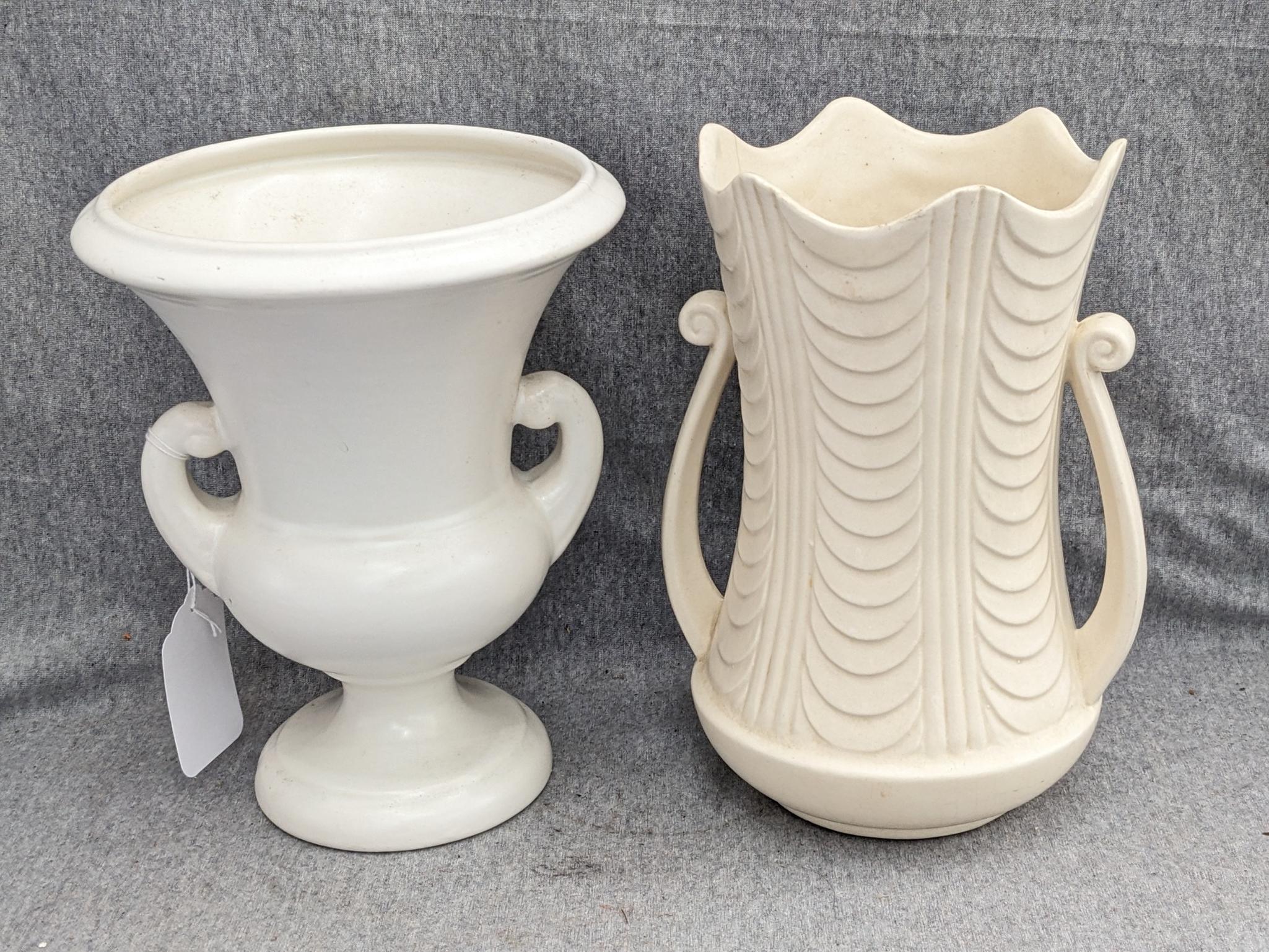 Haeger and other vase are both about 9-1/2" tall. Hairline crack noted on each rim, but otherwise