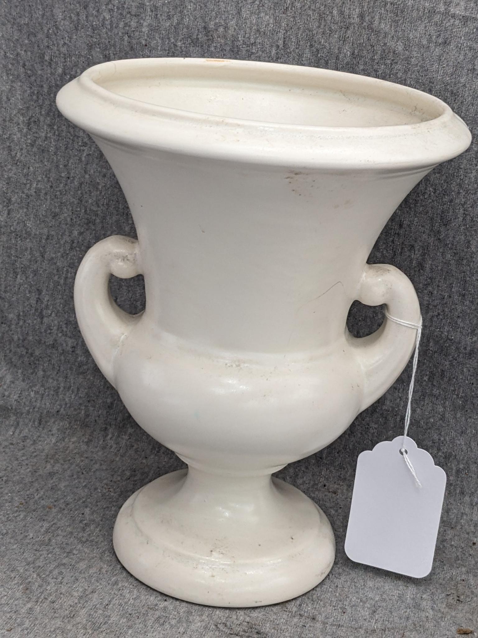 Haeger and other vase are both about 9-1/2" tall. Hairline crack noted on each rim, but otherwise