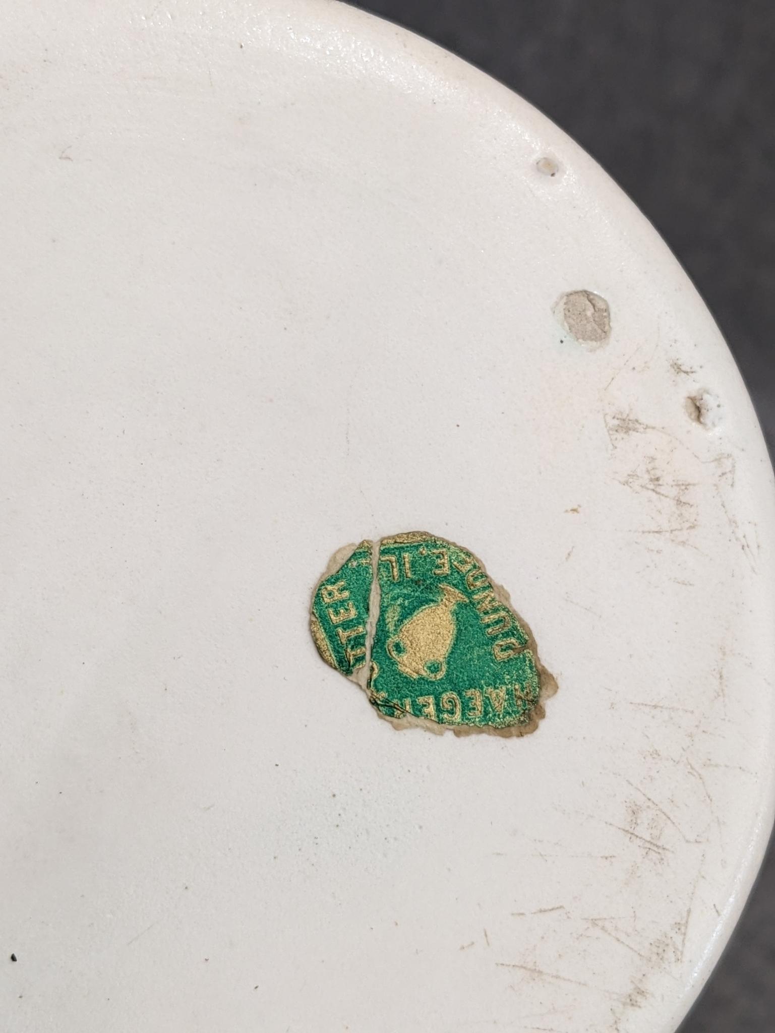 Haeger and other vase are both about 9-1/2" tall. Hairline crack noted on each rim, but otherwise