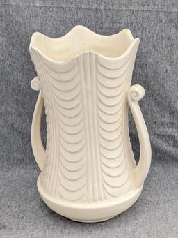 Haeger and other vase are both about 9-1/2" tall. Hairline crack noted on each rim, but otherwise