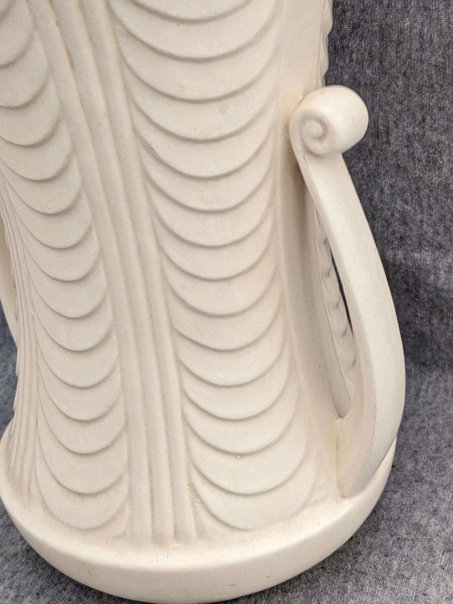 Haeger and other vase are both about 9-1/2" tall. Hairline crack noted on each rim, but otherwise