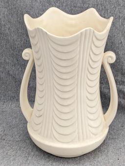 Haeger and other vase are both about 9-1/2" tall. Hairline crack noted on each rim, but otherwise